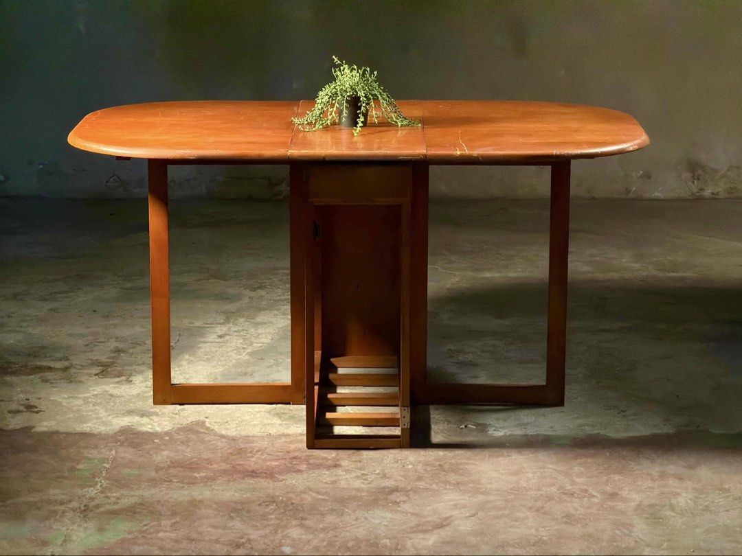 Mid-Century Danish teak drop-leaf dining table with a compact, folding design (Category: Tables & Sets) located in Bulacan. Submitted by rock_off.thriftshop.ph (Listing ID 1438430422, Image 3). Description: .