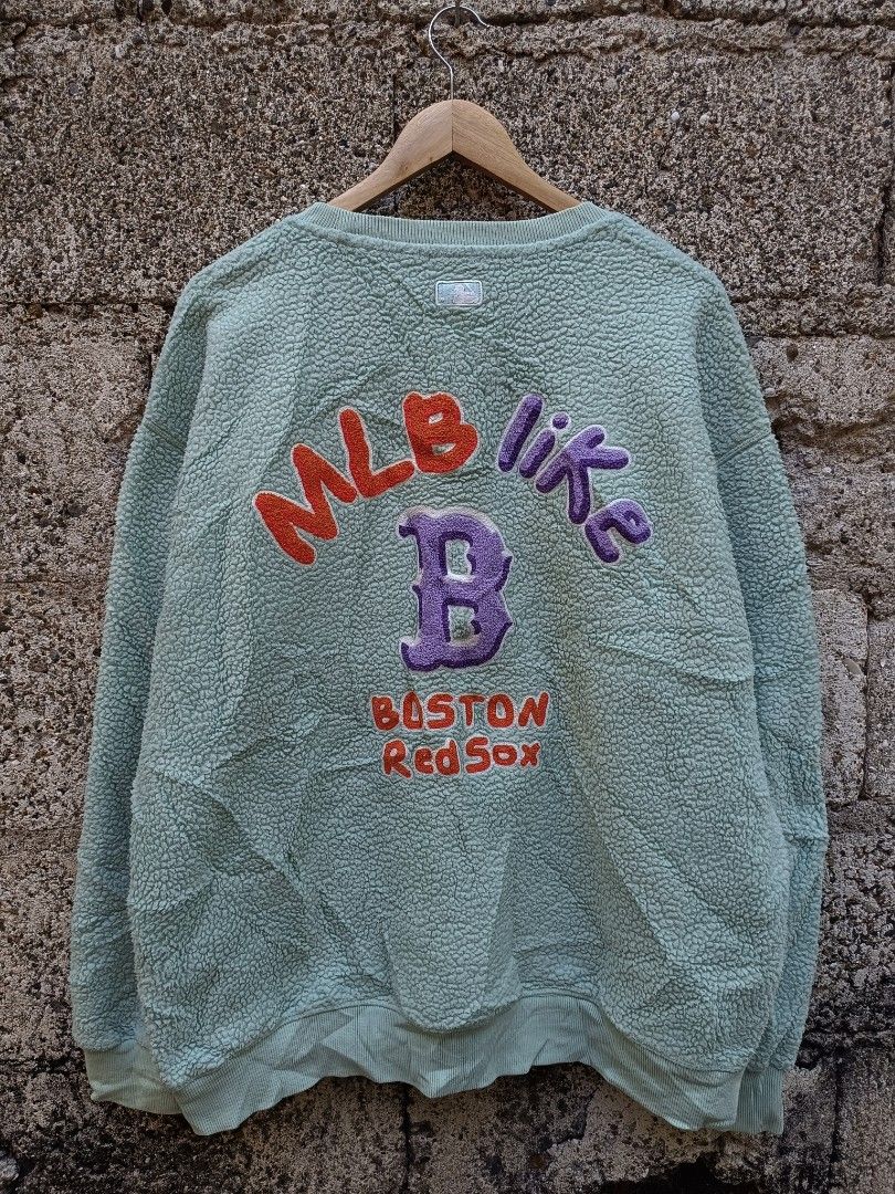 MLB Boston Red Sox Fleece Sweatshirt (Category: Coats, Jackets and Outerwear) located in Tubigon. Submitted by thrift_mac (Listing ID 1438497968, Image 2). Description: - Authentic MLB Boston Red Sox sweatshirt - Size: XL - Color: Light Teal - Features: Red Sox logo on front and a larger design on the back - Material: Fleece - Neckline: Crew neck - Condition: Genuine merchandise.