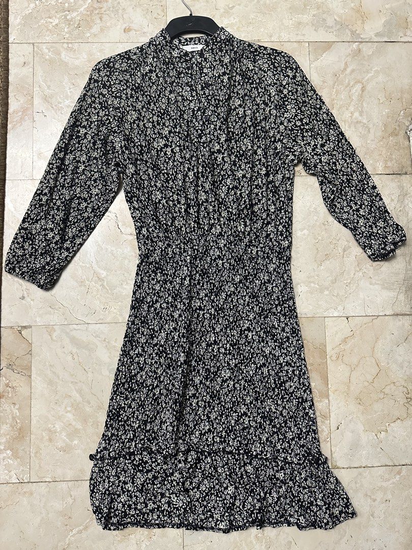 MNG Floral Dress - Size S (Category: Dresses) located in Malabon City. Submitted by igigs (Listing ID 1438457719, Image 3). Description: - MNG floral dress - Size: S - Print: Black and white floral - Features: Long sleeves, shirred waist, button-down front, ruffled hem - Made in China - Measurements: Shoulder - 16", Length - 38".