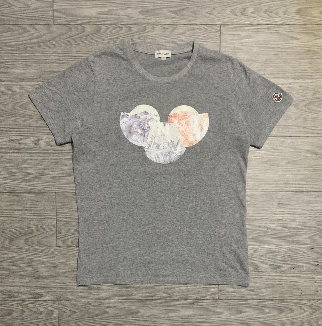 Moncler Tri Logo Print T-Shirt (Category: Luxury Apparel) located in Pozorrubio. Submitted by plco. (Listing ID 1438467395, Image 1). Description: Moncler Tri Logo Print T-Shirt 2 on tag 20x27 color rate: 10/10 complete tags excellent condition no issue.