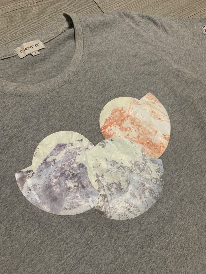 Moncler Tri Logo Print T-Shirt (Category: Luxury Apparel) located in Pozorrubio. Submitted by plco. (Listing ID 1438467395, Image 3). Description: Moncler Tri Logo Print T-Shirt 2 on tag 20x27 color rate: 10/10 complete tags excellent condition no issue.