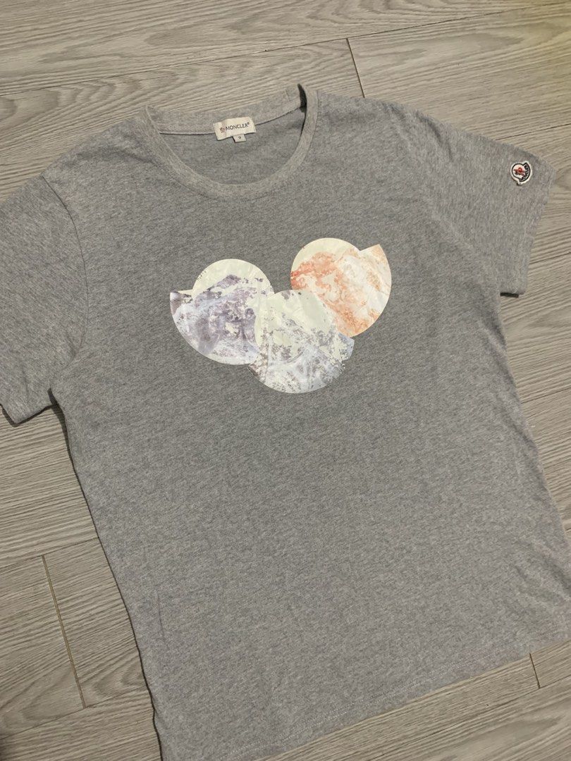 Moncler Tri Logo Print T-Shirt (Category: Luxury Apparel) located in Pozorrubio. Submitted by plco. (Listing ID 1438467395, Image 2). Description: Moncler Tri Logo Print T-Shirt 2 on tag 20x27 color rate: 10/10 complete tags excellent condition no issue.
