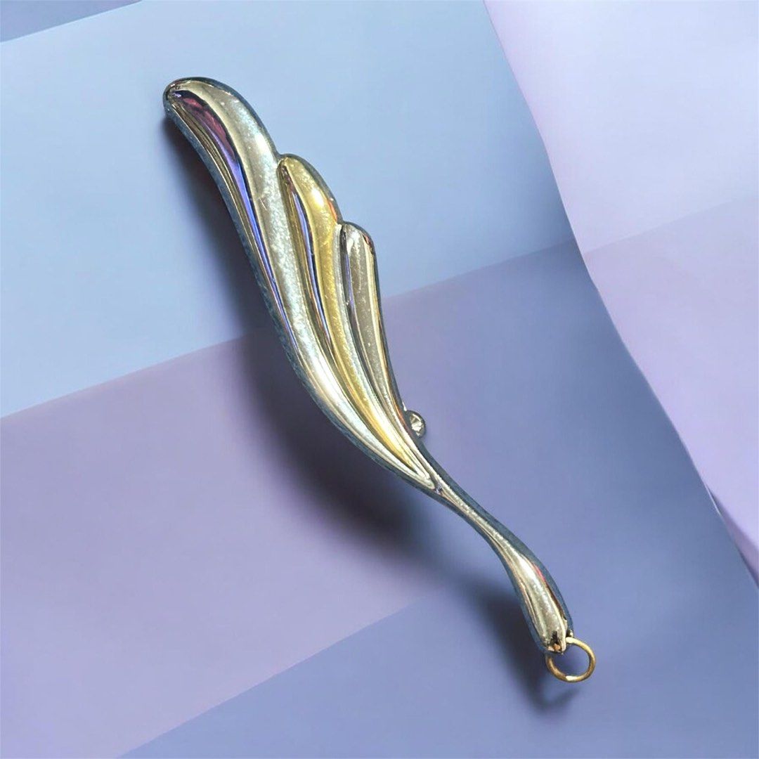 Napier two-toned silver and gold open wave brooch (Category: Brooches) located in Angeles City. Submitted by zyeplustradings (Listing ID 1438334532, Image 1). Description: Napier two-toned silver and gold open wave brooch Metal Finish: Two-tone overlay pairing warm yellow gold tones with contrasting silver or rhodium accents. .