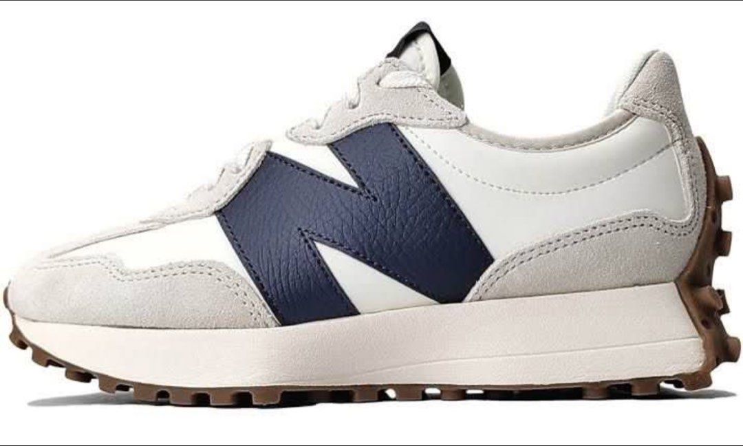 New Balance 327 Sneakers - White/Navy (Category: Sneakers) located in Manila. Submitted by declutterdoctor (Listing ID 1438458921, Image 2). Description: - New Balance 327 sneakers - White and navy color scheme - White and brown sole - Comfortable and stylish for everyday use - needs cleaning - well used, with signs of usage.