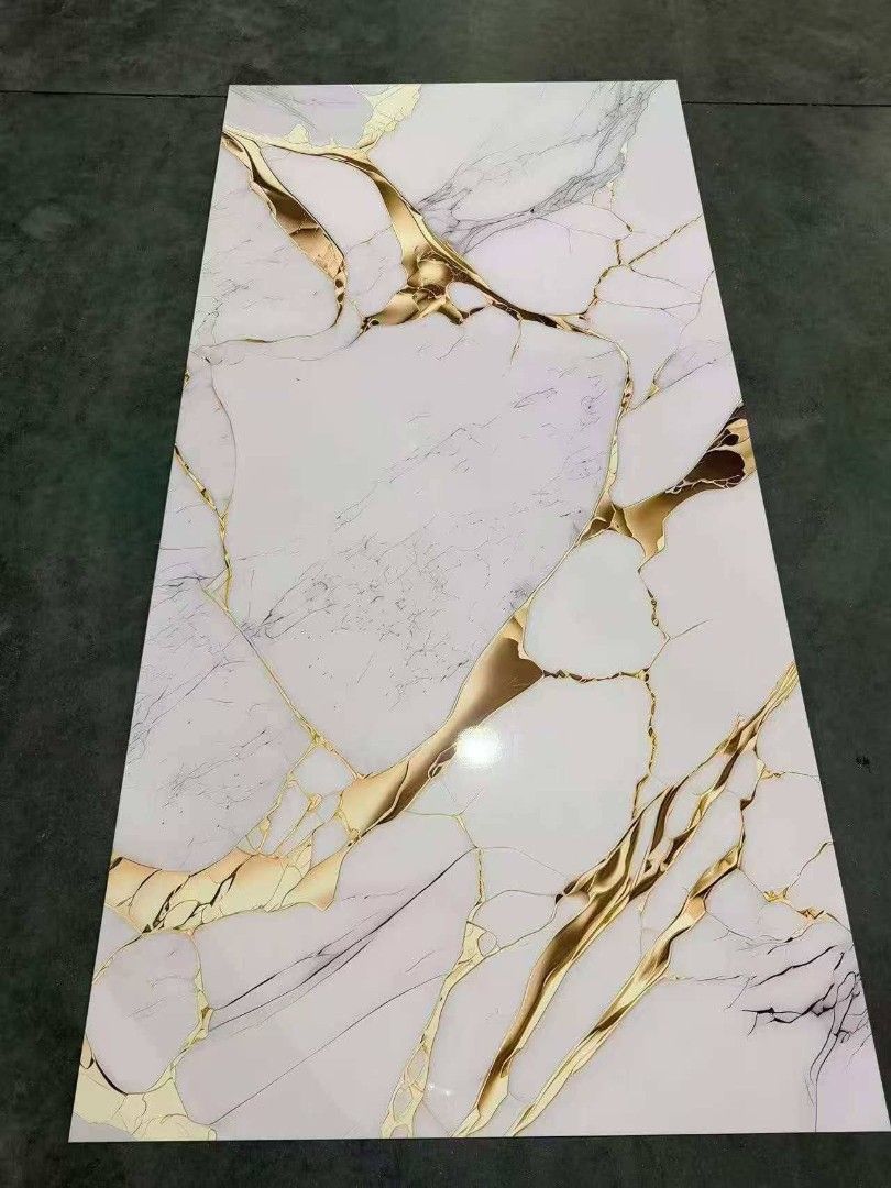 New designs of uv board (Category: Home Improvement Tools & Accessories) located in Manila. Submitted by brightstar.b55721 (Listing ID 1438340811, Image 1). Description: New designs of uv board size: 4x8feet cash on deliver delivery is shoulder by buyer discription: This item features a luxurious marble-inspired design with elegant gray and white textures accented by striking gold vein patterns. The glossy finish gives it a premium and sophistica