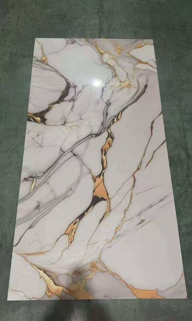 New designs of uv board (Category: Home Improvement Tools & Accessories) located in Manila. Submitted by brightstar.b55721 (Listing ID 1438340811, Image 3). Description: New designs of uv board size: 4x8feet cash on deliver delivery is shoulder by buyer discription: This item features a luxurious marble-inspired design with elegant gray and white textures accented by striking gold vein patterns. The glossy finish gives it a premium and sophistica