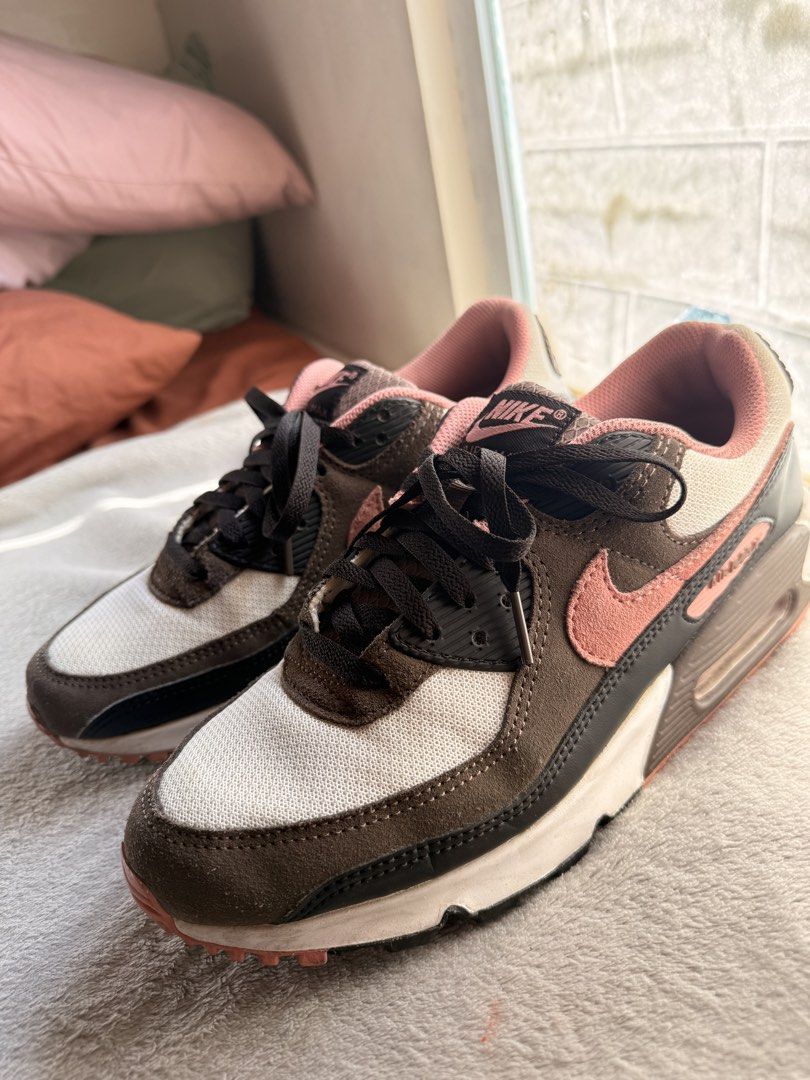 Nike AirMax 90 (Category: Sneakers) located in Pasig City. Submitted by ianmitch1540 (Listing ID 1438389823, Image 1). Description: Pink and brown colorway Shoes are well taken care off. Regularly cleaned and stored well in-box Normal wear and tear, no major issues No scruff marks Used for leisurely walking only on flat roads, surfaces With original box .