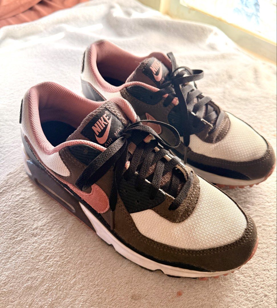Nike AirMax 90 (Category: Sneakers) located in Pasig City. Submitted by ianmitch1540 (Listing ID 1438389823, Image 2). Description: Pink and brown colorway Shoes are well taken care off. Regularly cleaned and stored well in-box Normal wear and tear, no major issues No scruff marks Used for leisurely walking only on flat roads, surfaces With original box .