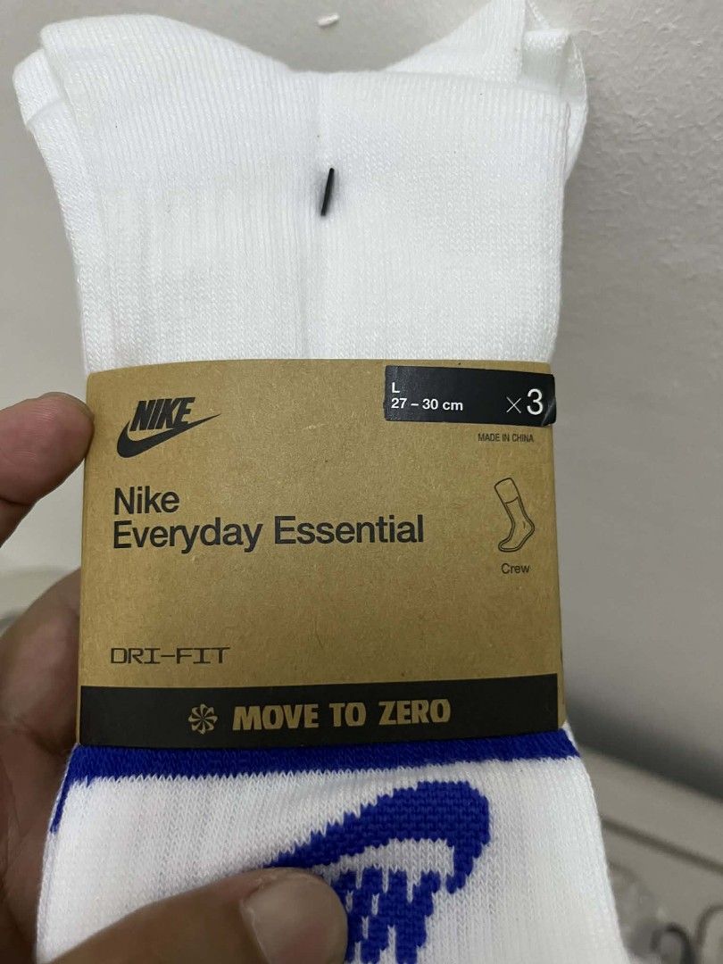 Nike Everyday Essential Crew Socks (Category: Socks) located in Caloocan City. Submitted by savastrid (Listing ID 1438307139, Image 2). Description: - Nike Everyday Essential crew socks - White with blue stripe and Nike logo - Size L (fits shoe sizes 27-30 cm) - Pack of 3 pairs - Features Dri-FIT technology.