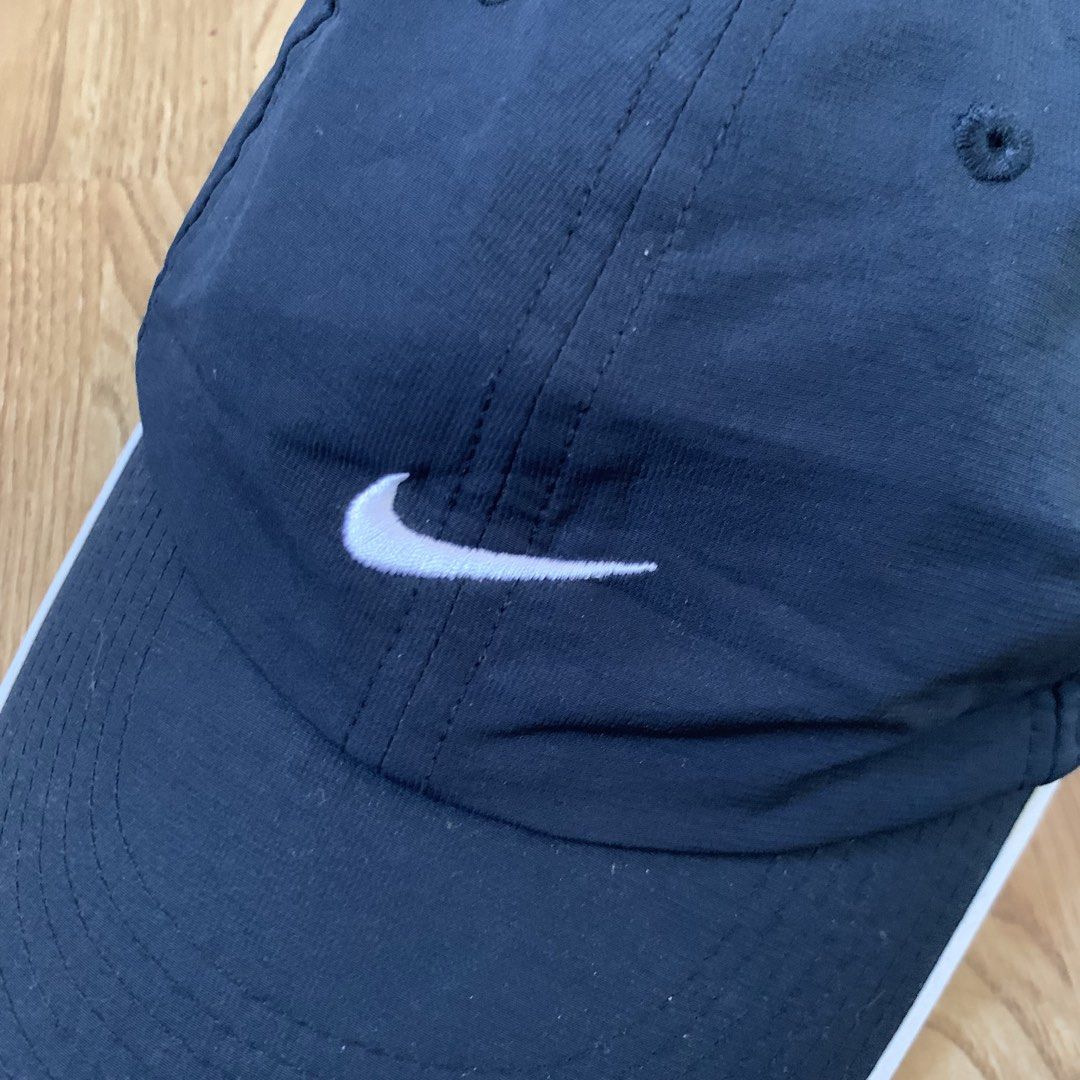 Nike Fit Dry Cap (Category: Caps & Hats) located in Cebu City. Submitted by zen.lasonking (Listing ID 1438449798, Image 2). Description: - Navy blue Nike cap - White Nike logo on front - White trim on brim - Adjustable strap with Nike Fit logo - Size: 56/58cm - Material: 100%.