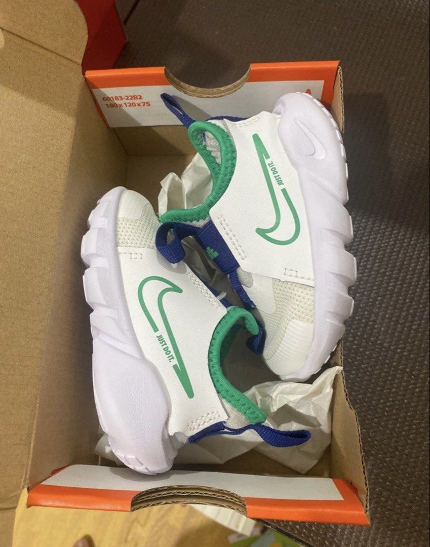 Nike Flex Runner 2 (TDV) - Summit White (Category: Babies & Kids Fashion) located in Samal. Submitted by dettyp (Listing ID 1438357742, Image 1). Description: - Nike Flex Runner 2 (TDV) - Color: Summit White/Stadium Green - White mesh upper with green accents - Blue strap detail - Size: UK 3.5, EUR 19.5 - Includes original box - Sole: White - Box details: cm10, BR 18.5.