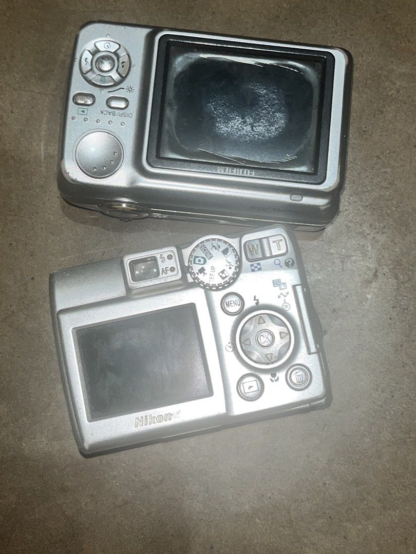 Nikon Coolpix & Fujifilm FinePix untested cams (Category: Cameras) located in Quezon City. Submitted by charitydonations (Listing ID 1438327019, Image 3). Description: - Silver digital cameras available. - Camera 1: Nikon Coolpix 500 with zoom lens. - Camera 2: Fujifilm FinePix with 6.3 megapixels. - Both cameras are untested. No batteries included purchase your own.