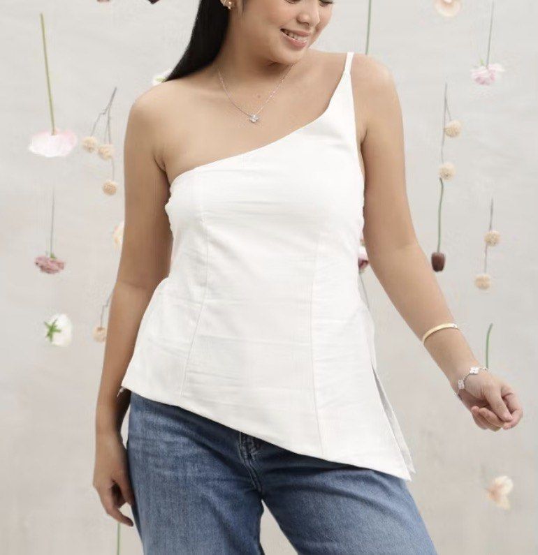Venus Linen Top - Denim Blue (Category: Sleeveless) located in Quezon City. Submitted by sage.ph (Listing ID 1438429546, Image 3). Description: - Available in blue and white - Brand new, washed only - Stretchable back - L-XL frames.