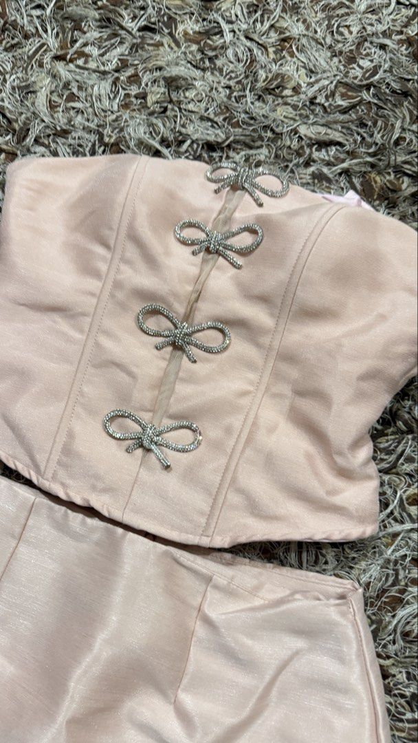 Pink Bow Coordinates Corset Tafta Fabric (Category: Sets or Coordinates) located in Pasig City. Submitted by ysa.declutters (Listing ID 1438465128, Image 2). Description: Large Bust 97 Waist 77 Corset type - Flaw: one ring missing from back - top used once only.