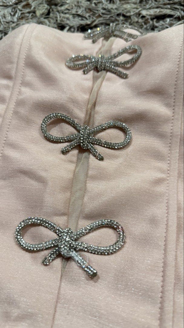 Pink Bow Coordinates Corset Tafta Fabric (Category: Sets or Coordinates) located in Pasig City. Submitted by ysa.declutters (Listing ID 1438465128, Image 3). Description: Large Bust 97 Waist 77 Corset type - Flaw: one ring missing from back - top used once only.