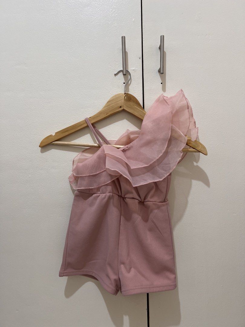 Pink Ruffle Romper (Category: Babies & Kids Fashion) located in Makati City. Submitted by pre-lovely (Listing ID 1438348887, Image 2). Description: "From my closet to yours! 💖🛍️ Preloved clothes looking for a new adventure! 💫 📍2-4yrs old ✨Condition: Good/Excellent ⚠️Note: Please manage expectations; used with love! 💰Mode of payment: Gcash/Bank 🚚Shipping : J&T/ Flash express 🚫 No: Returns, exchanges, or return for flaws. DM for details!🫶🛒