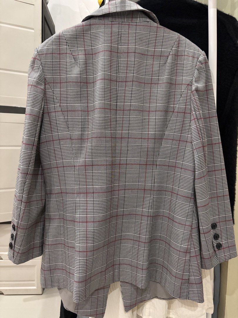 Plaid Blazer (Category: Coats, Jackets and Outerwear) located in Los Banos. Submitted by _loopee27 (Listing ID 1438350910, Image 2). Description: - Gray plaid blazer with red accents - Single-button closure - Long sleeves with buttoned cuffs - Classic tailored back - Adds sophistication to any outfit - Fit to Small to Medium .