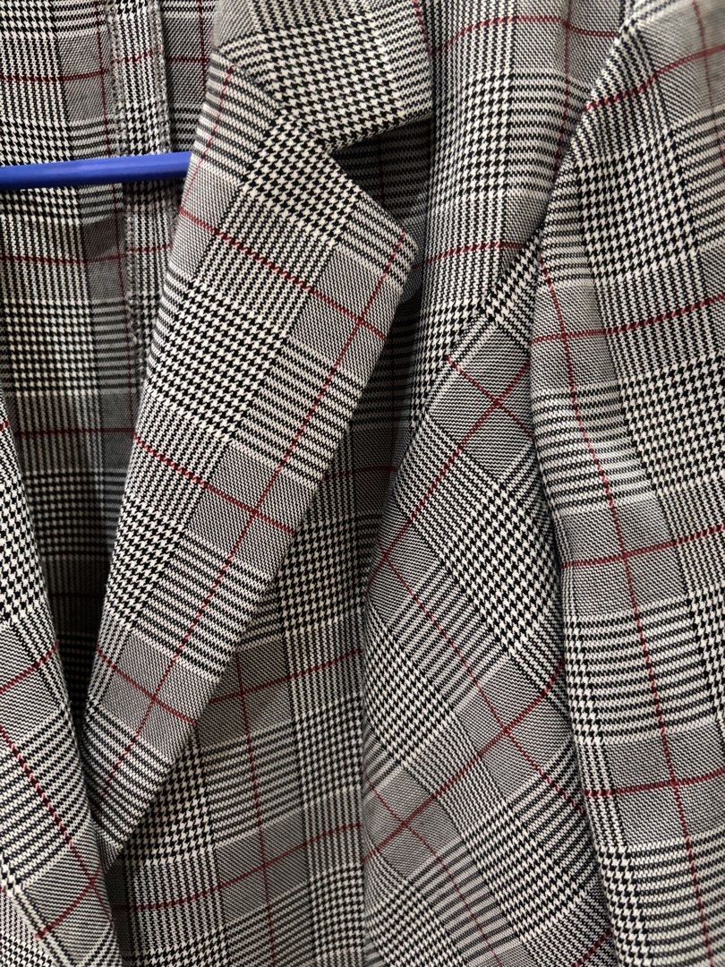 Plaid Blazer (Category: Coats, Jackets and Outerwear) located in Los Banos. Submitted by _loopee27 (Listing ID 1438350910, Image 3). Description: - Gray plaid blazer with red accents - Single-button closure - Long sleeves with buttoned cuffs - Classic tailored back - Adds sophistication to any outfit - Fit to Small to Medium .