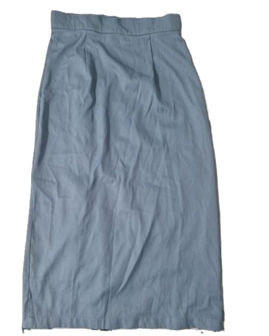 Plains & Prints Button-Down Midi Skirt (Category: Skirts) located in Quezon City. Submitted by declutter_bugg (Listing ID 1438396620, Image 2). Description: Condition: Like new (never used, only washed once) Bought in-store for 1500 php - Color: light blue - Button-down design - High-waisted with front slit - Size: UK 8 / US 4 - Material: 100% Polyester No pockets Measurements (approx; laid flat): - Waist: 14" - Length: 32" - Slit Length: 15.2".