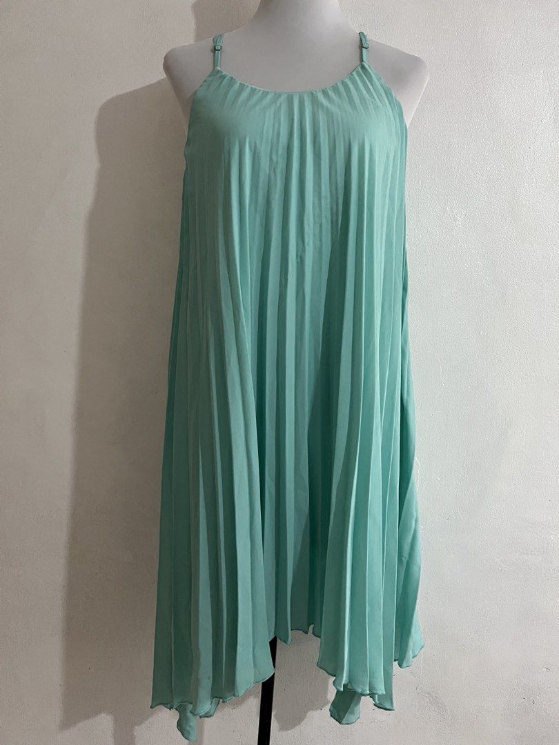 Pleated Halter Dress - XL (Category: Dresses) located in Quezon City. Submitted by leigh_preloved (Listing ID 1438317815, Image 1). Description: - Teal pleated dress - Halter neckline - Adjustable straps - Asymmetrical hem - Size: XL - Suitable for various occasions.