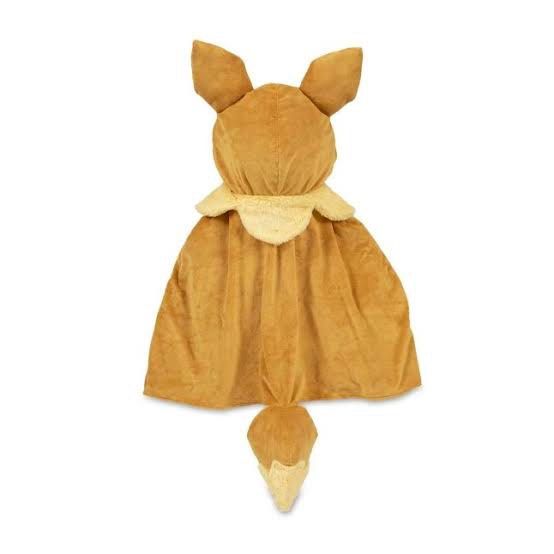 Pokemon Center Eevee Poncho (Category: Toys & Games) located in Quezon City. Submitted by dangogow (Listing ID 1438333979, Image 3). Description: - Eevee costume cape - Features Eevee's face and ears on the hood - Includes a fluffy collar and tail - Soft, brown texture - Designed to be worn over the shoulders - Ideal for cosplay and themed events.