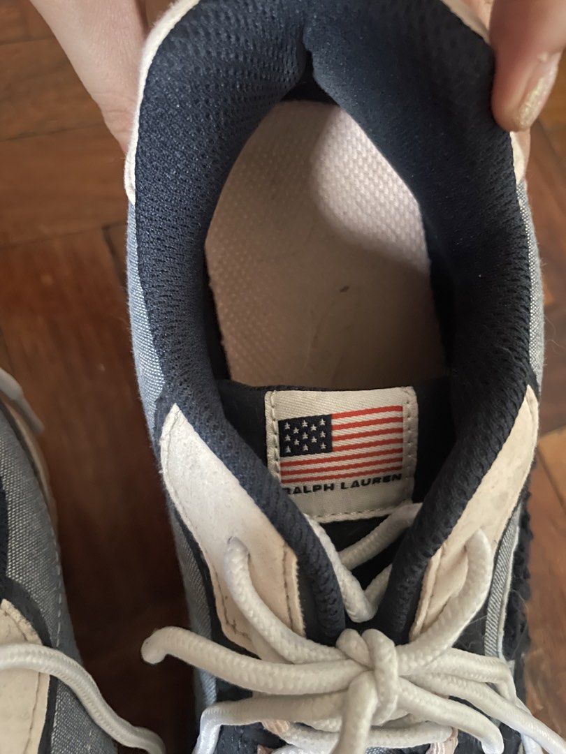 Polo Ralph Lauren Sneakers (Category: Sneakers) located in Mandaluyong City. Submitted by cesca2003 (Listing ID 1438358362, Image 3). Description: - Polo Ralph Lauren sneakers - Color: Grey, Black, and Beige - Size: 3.5 UK / 3 / 34.5 EUR / 23.1 cm - Features the iconic Polo logo - Made in Vietnam - White laces and brown sole.