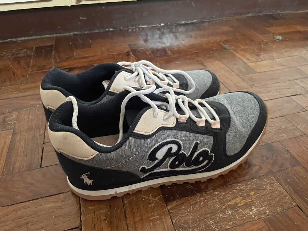 Polo Ralph Lauren Sneakers (Category: Sneakers) located in Mandaluyong City. Submitted by cesca2003 (Listing ID 1438358362, Image 1). Description: - Polo Ralph Lauren sneakers - Color: Grey, Black, and Beige - Size: 3.5 UK / 3 / 34.5 EUR / 23.1 cm - Features the iconic Polo logo - Made in Vietnam - White laces and brown sole.