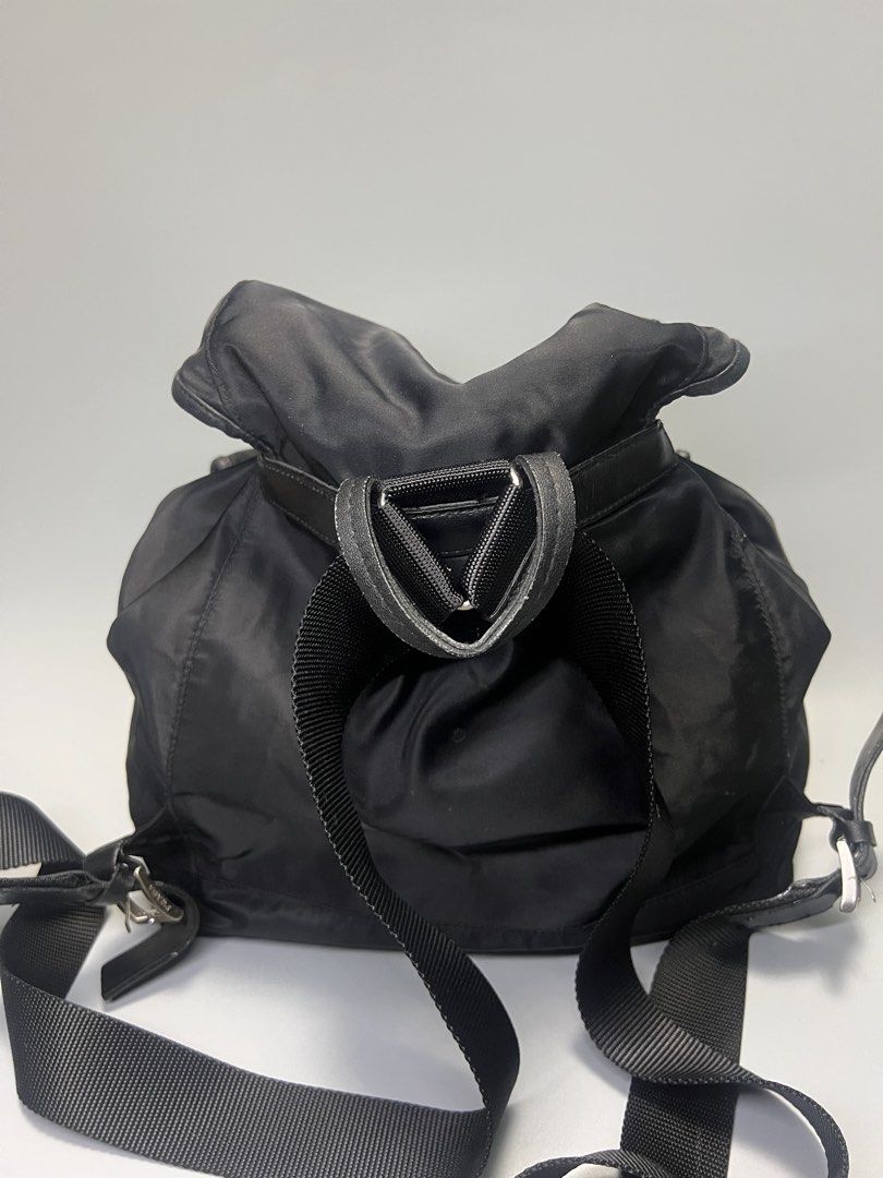 Prada Medium Re-Nylon backpack in black with silver-tone hardware. (Category: Backpacks) located in Iba. Submitted by curatedrock (Listing ID 1438459578, Image 2). Description: Prada Medium Re-Nylon backpack in black with silver-tone hardware. Rank AB Sign of usage Working zippers Authenticity not guarantee Good for personal😍.