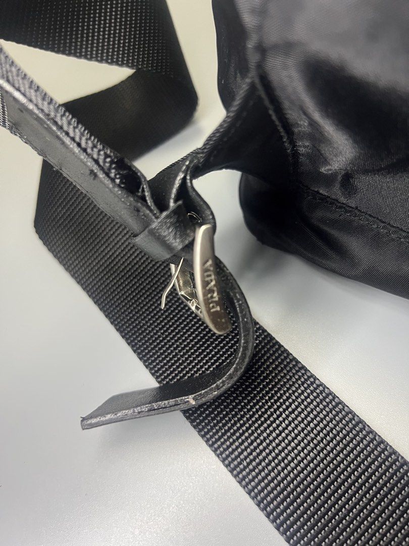 Prada Medium Re-Nylon backpack in black with silver-tone hardware. (Category: Backpacks) located in Iba. Submitted by curatedrock (Listing ID 1438459578, Image 3). Description: Prada Medium Re-Nylon backpack in black with silver-tone hardware. Rank AB Sign of usage Working zippers Authenticity not guarantee Good for personal😍.