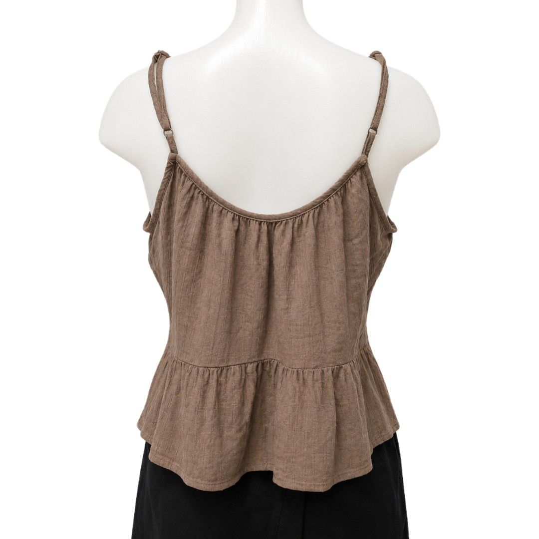Primark Cares Textured Peplum Cami Top (Category: Sleeveless) located in Makati City. Submitted by meowmyyyy (Listing ID 1438411753, Image 2). Description: • All details and measurements are shown in the photos. Please refer to them before purchasing. • Preloved unless stated brand new. Expect minimal signs of use. • Actual color may vary due to lighting and screen settings. • First to pay basis only. No long reservations. For reservation, partia