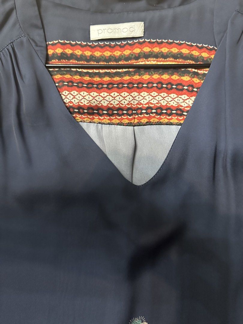 Promod Embroidered Navy Dress (Category: Dresses) located in Malabon City. Submitted by igigs (Listing ID 1438458265, Image 3). Description: - Navy dress - Embroidered floral details - V-neckline with patterned trim - Matching tie belt - Roll-up sleeves with button closure - Straight cut, knee-length - lightly used.