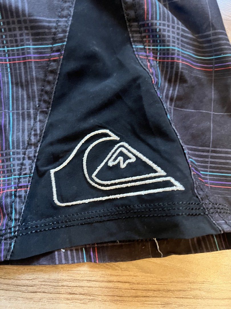 Quiksilver Board Shorts y2k (Category: Swim Trunks & Board Shorts) located in Pasig City. Submitted by grndhub (Listing ID 1438415904, Image 2). Description: - Original Quiksilver board shorts - Plaid pattern - Quiksilver logo on leg and waistband - Drawstring closure - Black panels on sides and back - Year early 2000s -Length approx 54cm Pick up Pasig.