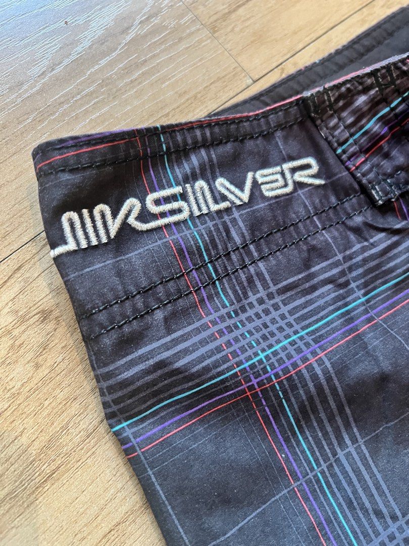Quiksilver Board Shorts y2k (Category: Swim Trunks & Board Shorts) located in Pasig City. Submitted by grndhub (Listing ID 1438415904, Image 3). Description: - Original Quiksilver board shorts - Plaid pattern - Quiksilver logo on leg and waistband - Drawstring closure - Black panels on sides and back - Year early 2000s -Length approx 54cm Pick up Pasig.