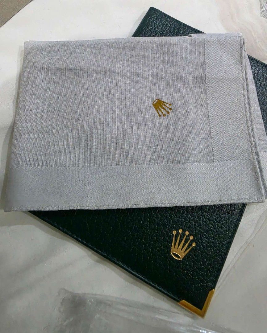 Rolex Wallet and Handkerchief/Napkin (Category: Luxury Bags & Wallets) located in Manila. Submitted by trplxn (Listing ID 1438386451, Image 1). Description: - Green leather wallet with Rolex logo - Multiple card slots - Matching white handkerchief with Rolex logo - Brand New Price: Passport Holder - 5500 Napkin - 2900.