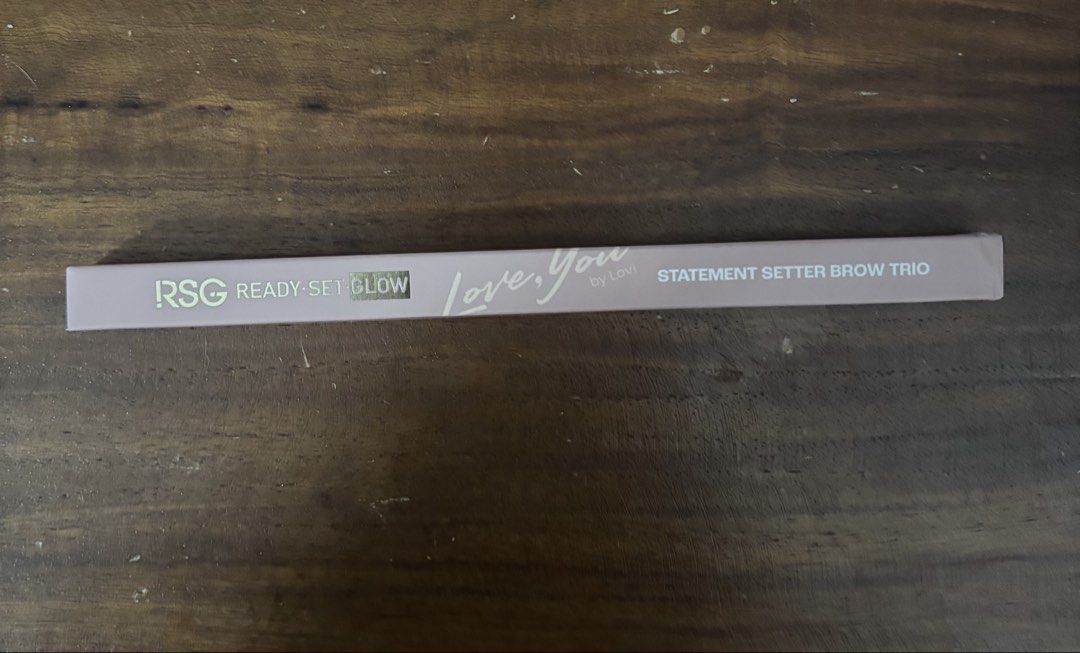 RSG Statement Setter Brow Trio (Category: Makeup) located in Taguig. Submitted by riverphoenix24 (Listing ID 1438465340, Image 2). Description: Shape, define, and set your brows with the RSG Statement Setter Brow Trio. This all-in-one trio features a pencil, gel, and spoolie for effortlessly sculpted brows. Key ingredients include Jojoba Seed Oil, Argan Oil, and Castor Oil. Available in Confidence Creed shade. Used once. Rfs: di bagay sa color ng