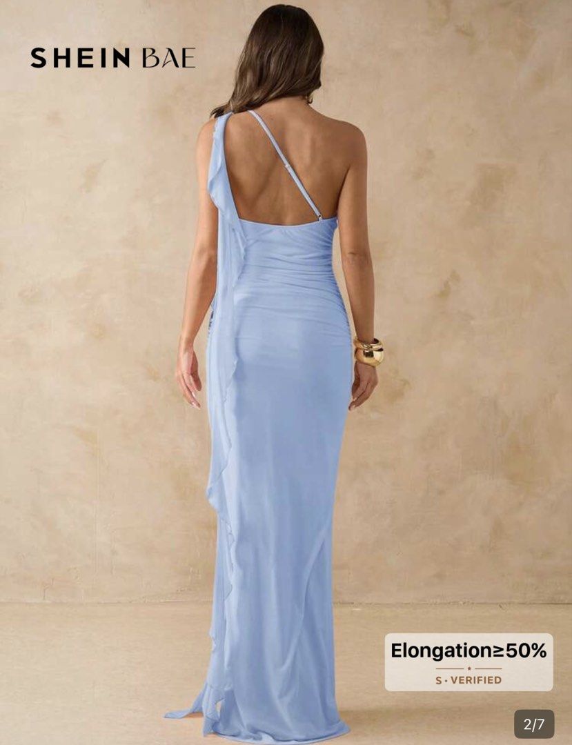 SHEIN Blue Long Backless Maxi Mesh Dress (Category: Dresses) located in Caloocan City. Submitted by trshmillenaa (Listing ID 1438452220, Image 3). Description: - Light blue color - Asymmetric design - Ruched bodice - Sinukat lang. hindi ginamit .
