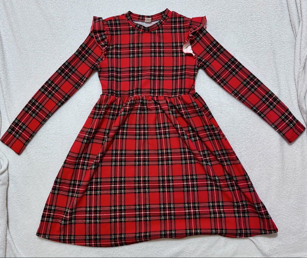 SHEIN Red Plaid Dress - Size 12Y (Category: Dresses) located in Mandaluyong City. Submitted by toront0427 (Listing ID 1438433417, Image 1). Description: - Red plaid pattern - Long sleeves - Ruffle details on shoulders - Gathered waist - Made in China.