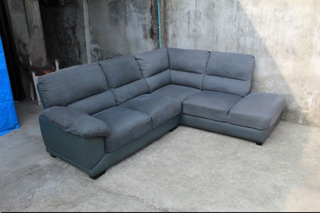 Sofa (Category: Sofas) located in Meycauayan. Submitted by marygracecasimiro (Listing ID 1438466751, Image 3). Description: NITORI Corner Sofa L-shape sectional sofa with stylish two-tone leather and fabric finish. High-back cushions, pocket coil comfort and sturdy Japanese quality construction. Modular design with detachable backrests and armrests for easy transport through narrow doors. Perfect for condos, apartments and modern homes L:90 & 73 