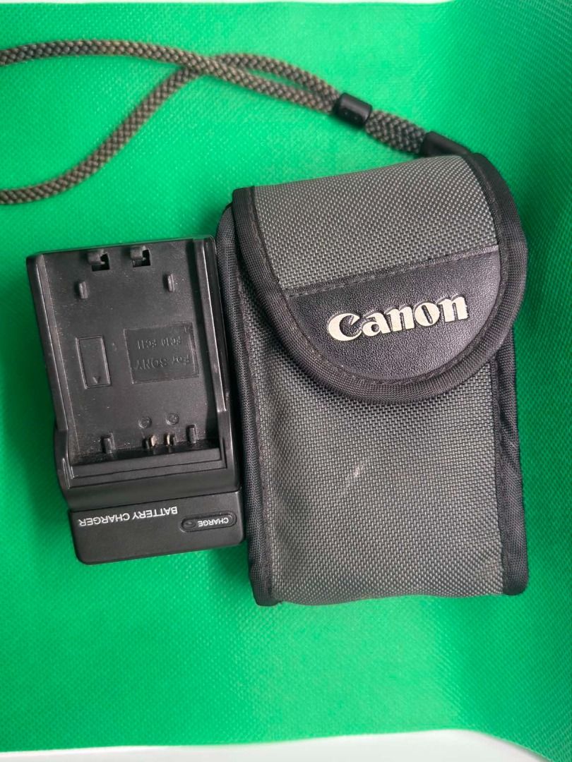 Sony Cybershot 4.0MP Digital Camera (Category: Cameras) located in Makati City. Submitted by thatisunique_thrift (Listing ID 1438478694, Image 3). Description: W/ Pouch and New batter and charger (Used once) Sensor issue - Sony Cybershot digital camera - 4.0 Megapixels - 3x Optical Zoom Lens (f/2.8-5.6, 5.8-24mm) - Includes Canon carrying case - Includes Sony battery charger - Features display screen and function buttons - Silver color.
