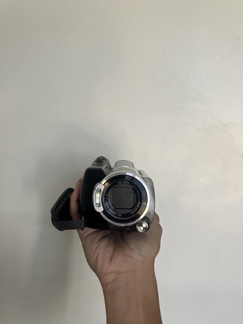 Sony Handycam HDR-SR11 Camcorder (Category: Video Cameras) located in Pasig City. Submitted by findshyt (Listing ID 1438433996, Image 2). Description: - Sony Handycam - HD video recording - 10.2MP still photos - Hybrid HDD 60gb storage - Carl Zeiss lens - 12x zoom - Black and silver color - Includes Sony hand strap - Night vision - Comes with battery, charger and cables - Ready to use ₱13,000 Can do shipping and same day delivery thru lalamove DM