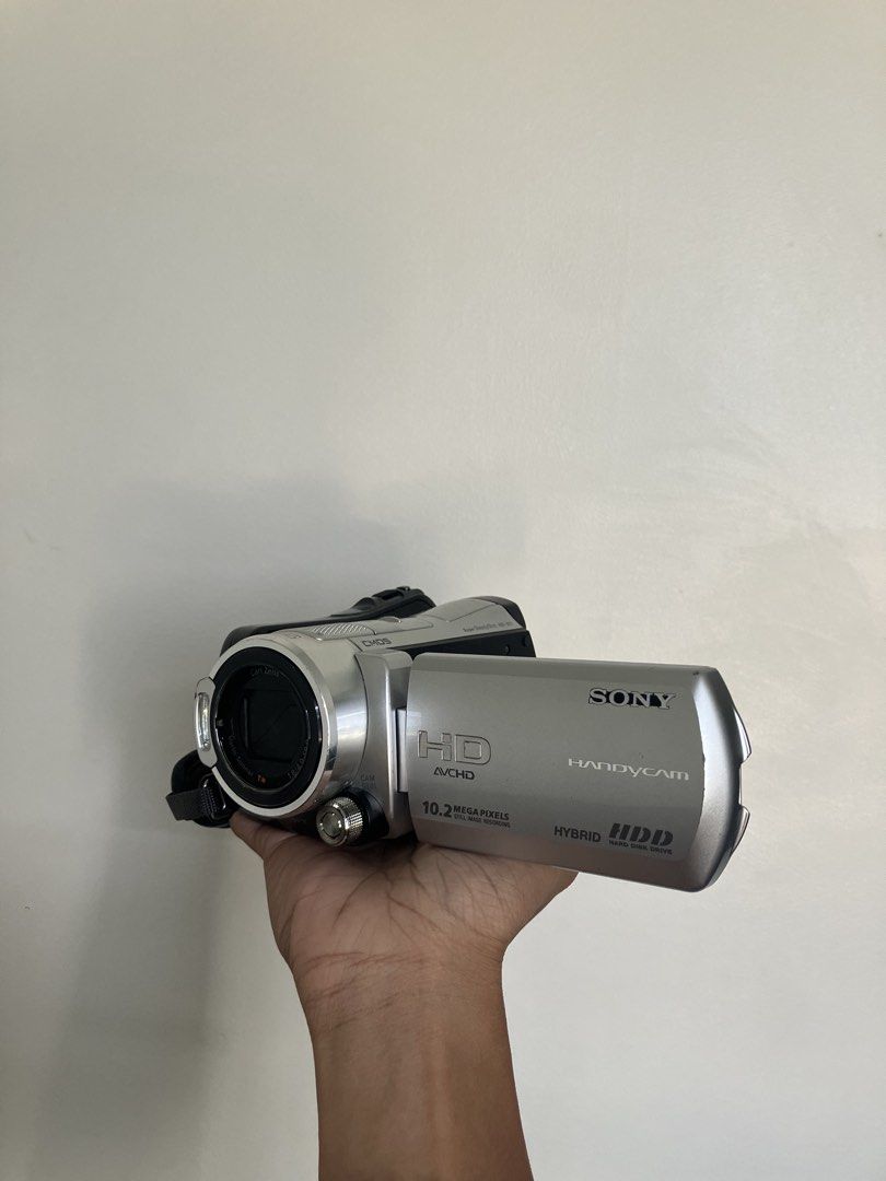 Sony Handycam HDR-SR11 Camcorder (Category: Video Cameras) located in Pasig City. Submitted by findshyt (Listing ID 1438433996, Image 3). Description: - Sony Handycam - HD video recording - 10.2MP still photos - Hybrid HDD 60gb storage - Carl Zeiss lens - 12x zoom - Black and silver color - Includes Sony hand strap - Night vision - Comes with battery, charger and cables - Ready to use ₱13,000 Can do shipping and same day delivery thru lalamove DM