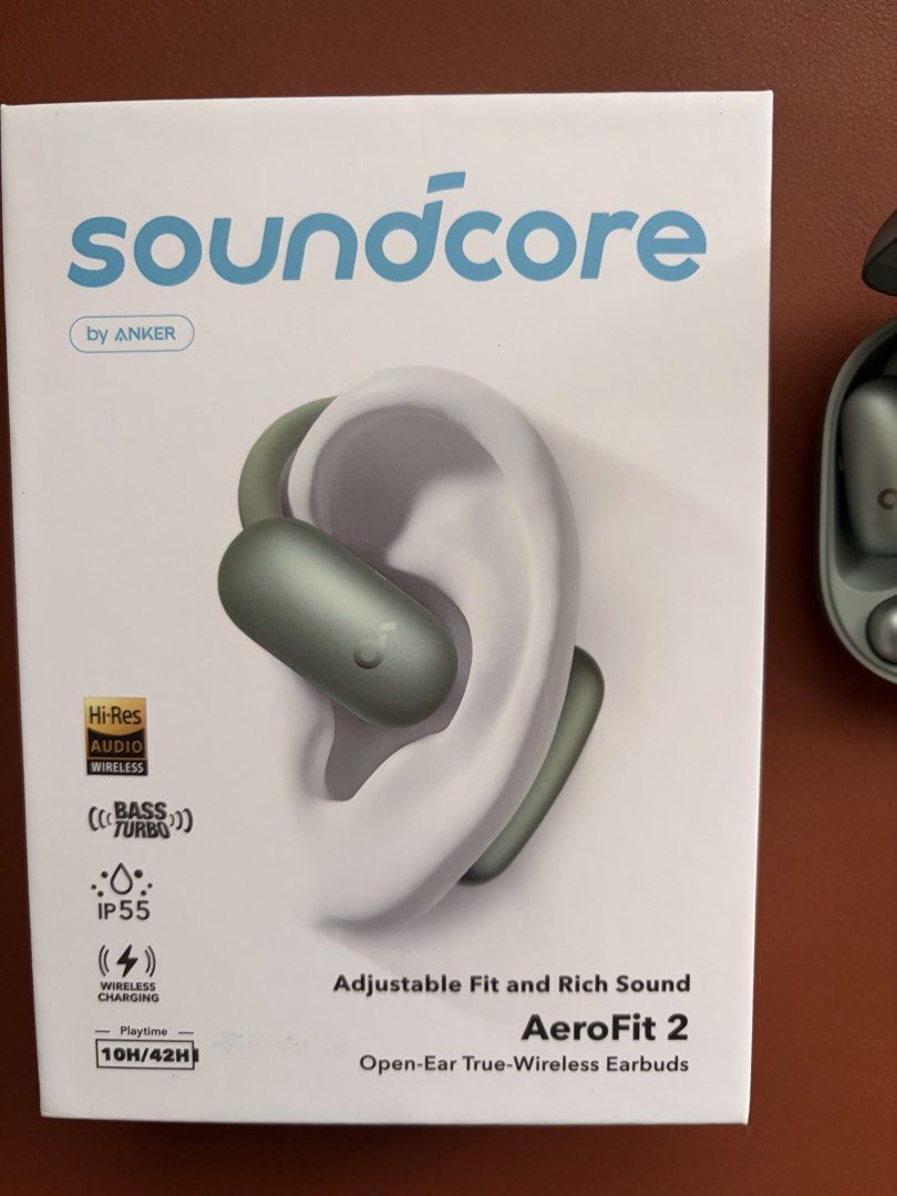 Soundcore AeroFit 2 Open-Ear Wireless Earbuds - Green (Category: Earphones) located in Singapore. Submitted by greenapplepie (Listing ID 1438413991, Image 2). Description: Soundcore AeroFit 2 earbuds in green and like-new condition (use it less than 5 times), doesn’t suit to my liking. Features include open-ear design, wireless charging, and IP55 water resistance. Enjoy up to 10 hours of playtime. Comes with the original box..