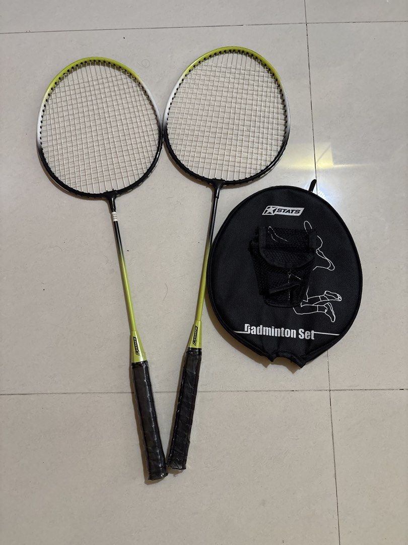 STATS Badminton Set - 2 Rackets with Case (Category: Racket & Ball Sports) located in Singapore. Submitted by alagujothi45866398 (Listing ID 1438309563, Image 1). Description: - Complete badminton set - Includes two rackets - Comes with a carrying case - Rackets: Black and yellow - Case features a storage pocket - Ideal for casual play or beginners.