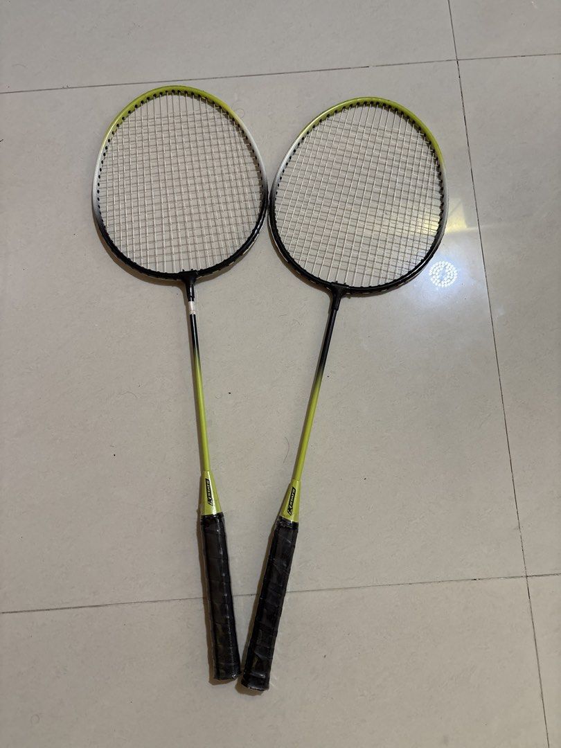 STATS Badminton Set - 2 Rackets with Case (Category: Racket & Ball Sports) located in Singapore. Submitted by alagujothi45866398 (Listing ID 1438309563, Image 2). Description: - Complete badminton set - Includes two rackets - Comes with a carrying case - Rackets: Black and yellow - Case features a storage pocket - Ideal for casual play or beginners.