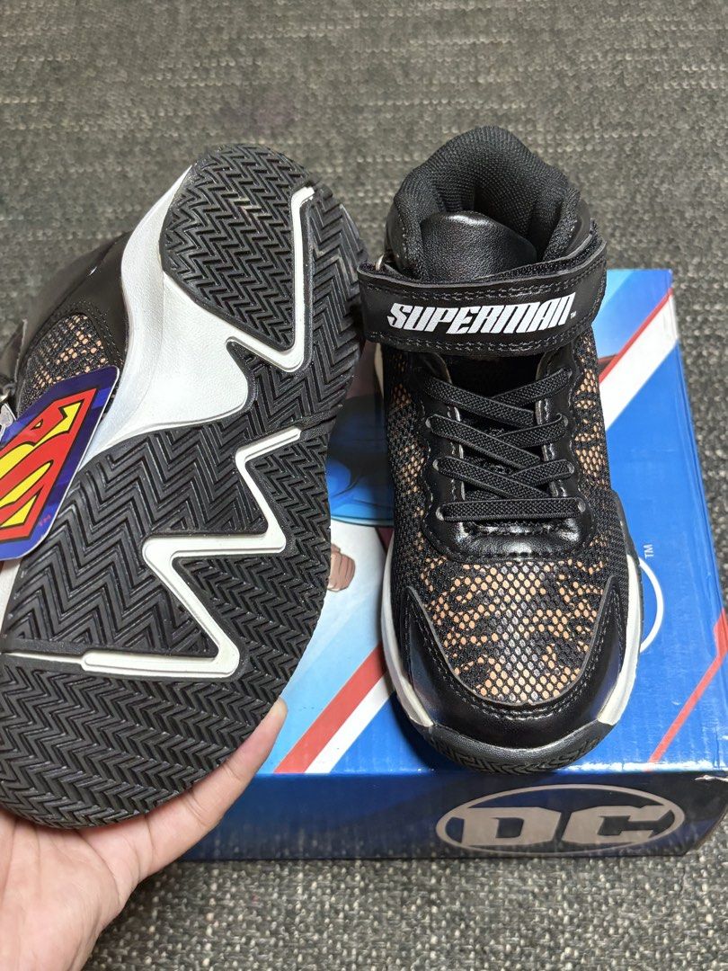 Superman Kids' Shoes Size 28 (Category: Babies & Kids Fashion) located in Mabalacat. Submitted by fhey.09 (Listing ID 1438418995, Image 2). Description: - Superman kids' shoes - Size 28 - Black and white color scheme - Unique pattern on front - Velcro strap with Superman logo - Comes with original box.