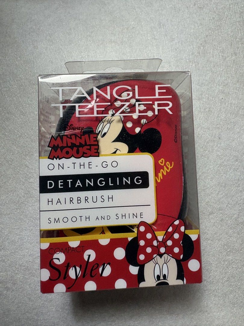 Tangle Teezer Disney Minnie Mouse Limited Edition (Category: Hair Accessories) located in San Fernando. Submitted by sammypgirl (Listing ID 1438490765, Image 3). Description: Limited Edition Disney Minnie Mouse Tangle Teezer with authentication sticker On the go Detangling Brush Ideal for straight-to-wavy hair types, Tangle Teezer patented two-tiered teeth technology is the star of the show. Gliding through wet and dry hair, the long teeth detang