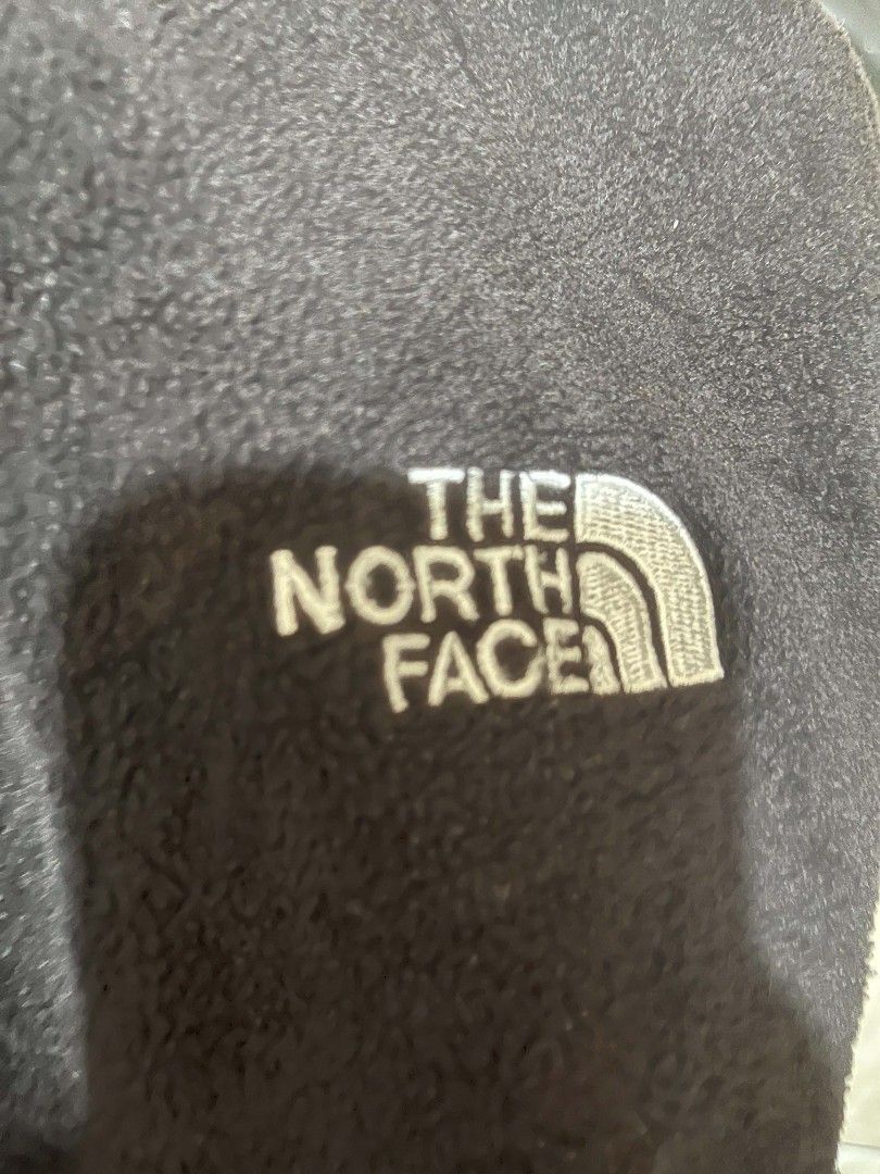 The North Face Fleece Jacket XL (Category: Coats, Jackets and Outerwear) located in Cagayan de Oro. Submitted by neyothrift (Listing ID 1438332628, Image 2). Description: - The North Face fleece jacket - Color: Dark grey - Size: XL - Full zip closure - Small logo on chest - Two buttons on sleeves - High collar - "Complimentary Products" tag.