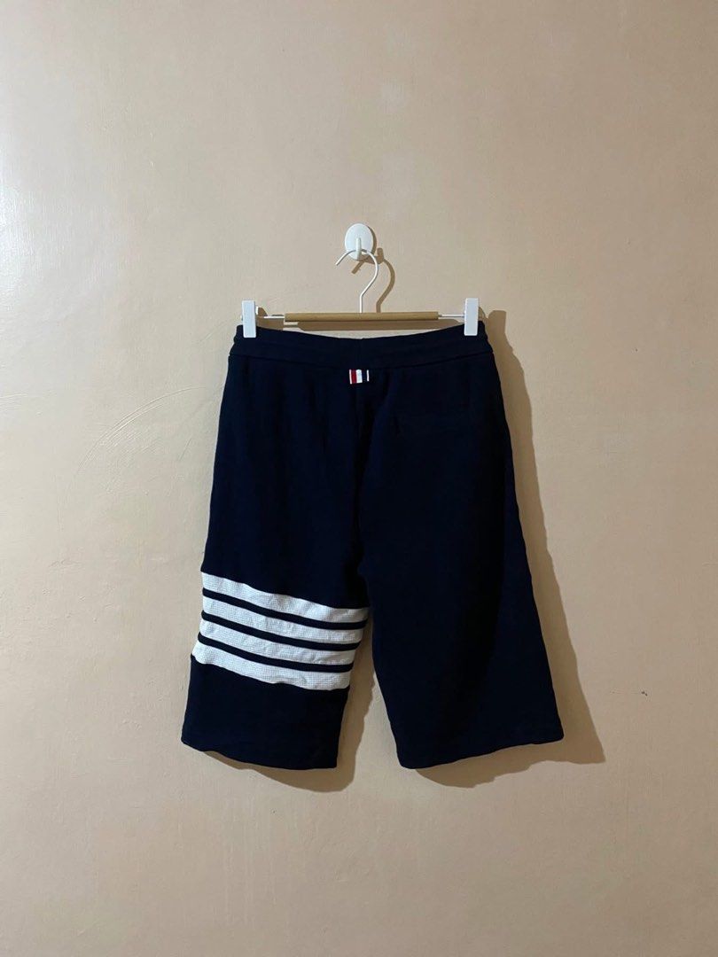 Thom Browne Waffle 4-Bar Sweatshort (Category: Luxury Apparel) located in Naga. Submitted by trashfinds (Listing ID 1438441154, Image 2). Description: Size: 1 on tag Actual measure waistline: 13.5” Length: 22” Hem: 10” Color rate: 9.5/10 Issue: none Need wash.