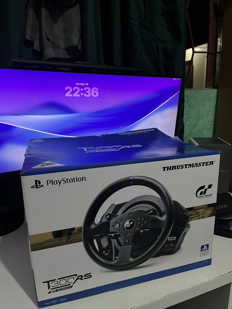 Thrustmaster T300RS GT Edition (Category: Controllers) located in Manila. Submitted by eunixverse (Listing ID 1438313202, Image 3). Description: - Thrustmaster T300RS GT racing wheel - Compatible with PS5 and PS4 - Includes: - Wheel with integrated buttons and paddle shifters - Pedal set (three pedals) - Power adapter - Original box - Includes receipt and complete packaging - Bought on June 29, 2024 from DataBlitz. RFS: Di na nagagamit..
