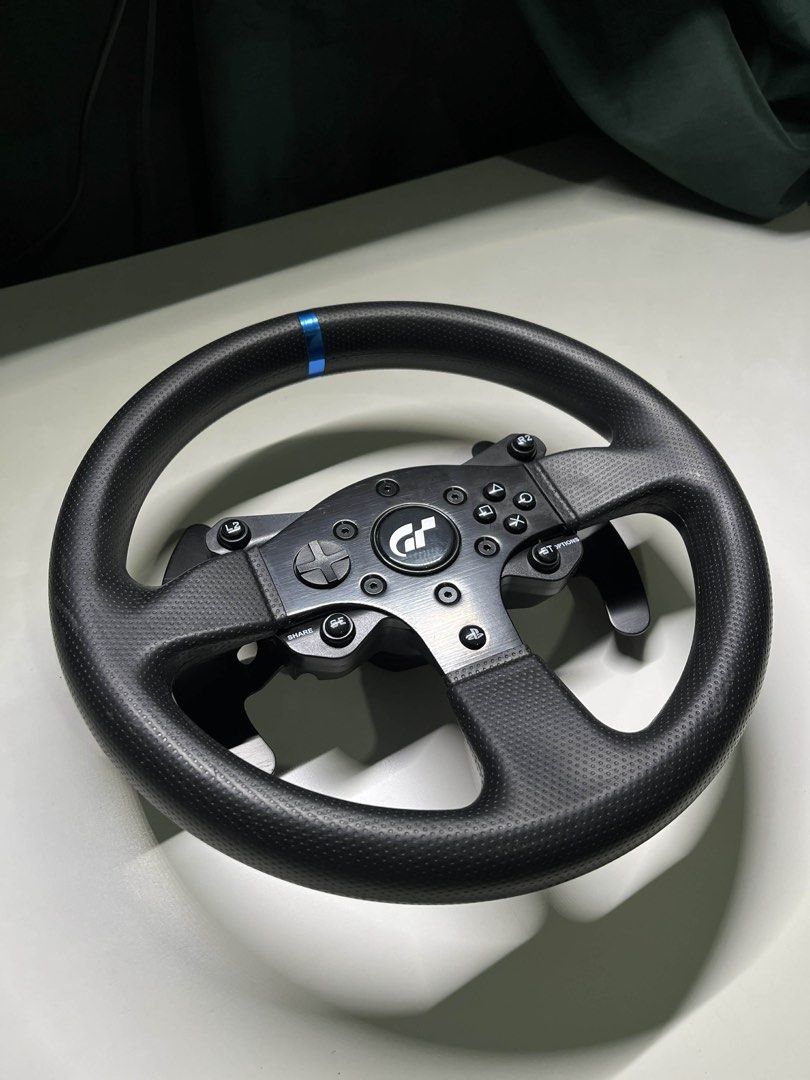 Thrustmaster T300RS GT Edition (Category: Controllers) located in Manila. Submitted by eunixverse (Listing ID 1438313202, Image 1). Description: - Thrustmaster T300RS GT racing wheel - Compatible with PS5 and PS4 - Includes: - Wheel with integrated buttons and paddle shifters - Pedal set (three pedals) - Power adapter - Original box - Includes receipt and complete packaging - Bought on June 29, 2024 from DataBlitz. RFS: Di na nagagamit..